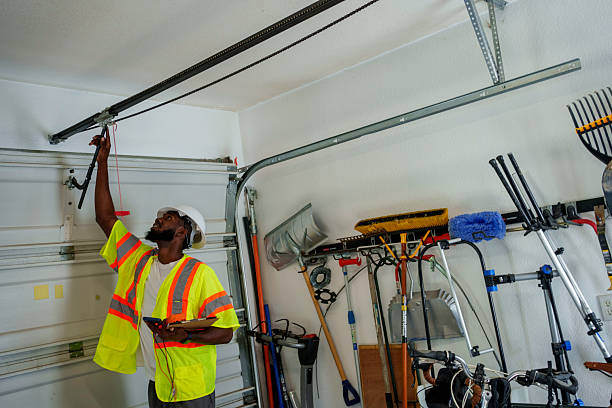 Professional Garage Door Roller Replacement technician working in Manitowoc, WI